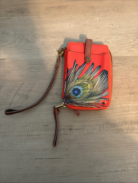 Elliott Lucca Handbags - orange leather Elliott Lucca wristlet features a hand-painted peacock feather